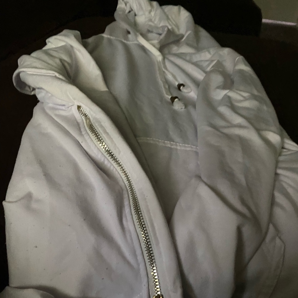 White hoodie with zippers on sleeves and side
